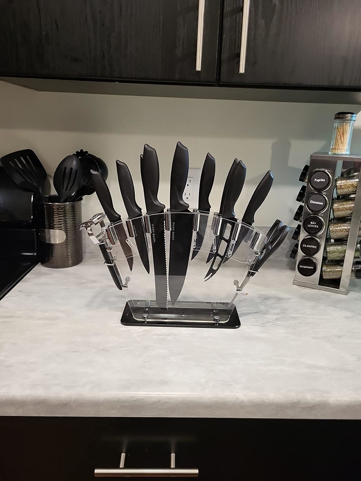 Reviewer&#x27;s photo of the knife set in the color Black, displayed in the acrylic knife block