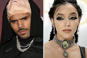 Chris Brown mean mugs as he poses for a photo in a costume vs Tinashe looks off to the right as she has her picture taken