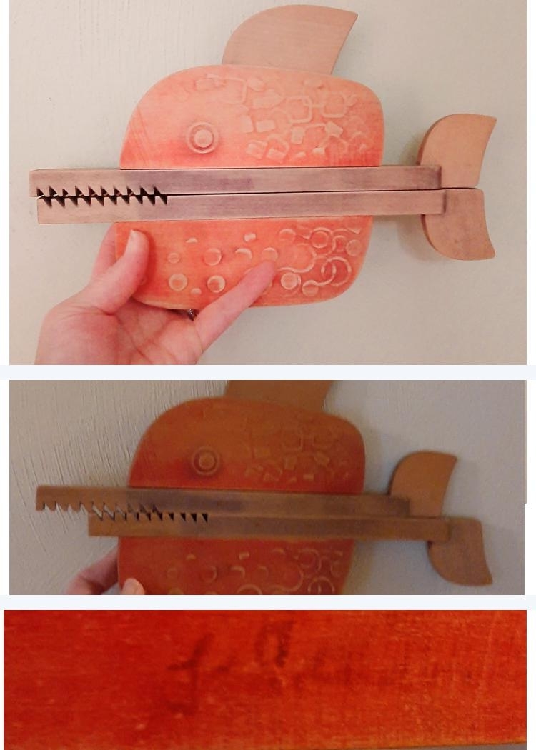 looks like a fish with pointy teeth that slide back and forth