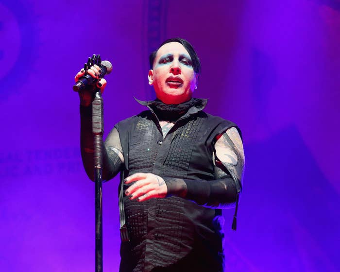 Marilyn Manson fined for blowing nose on concert camerawoman - BBC News