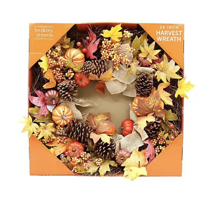 Product image of fall wreath adorned with pine cones and leaves