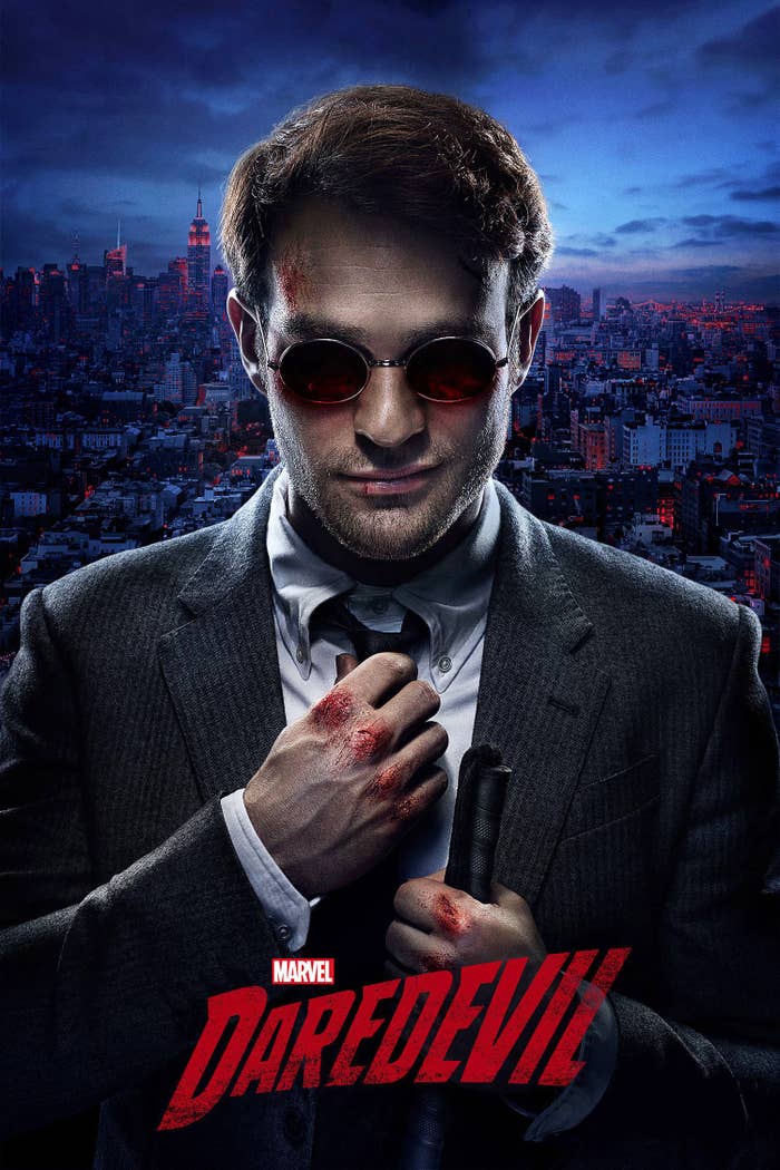 A promo poster for Daredevil featuring Charlie Cox with beaten up knuckles