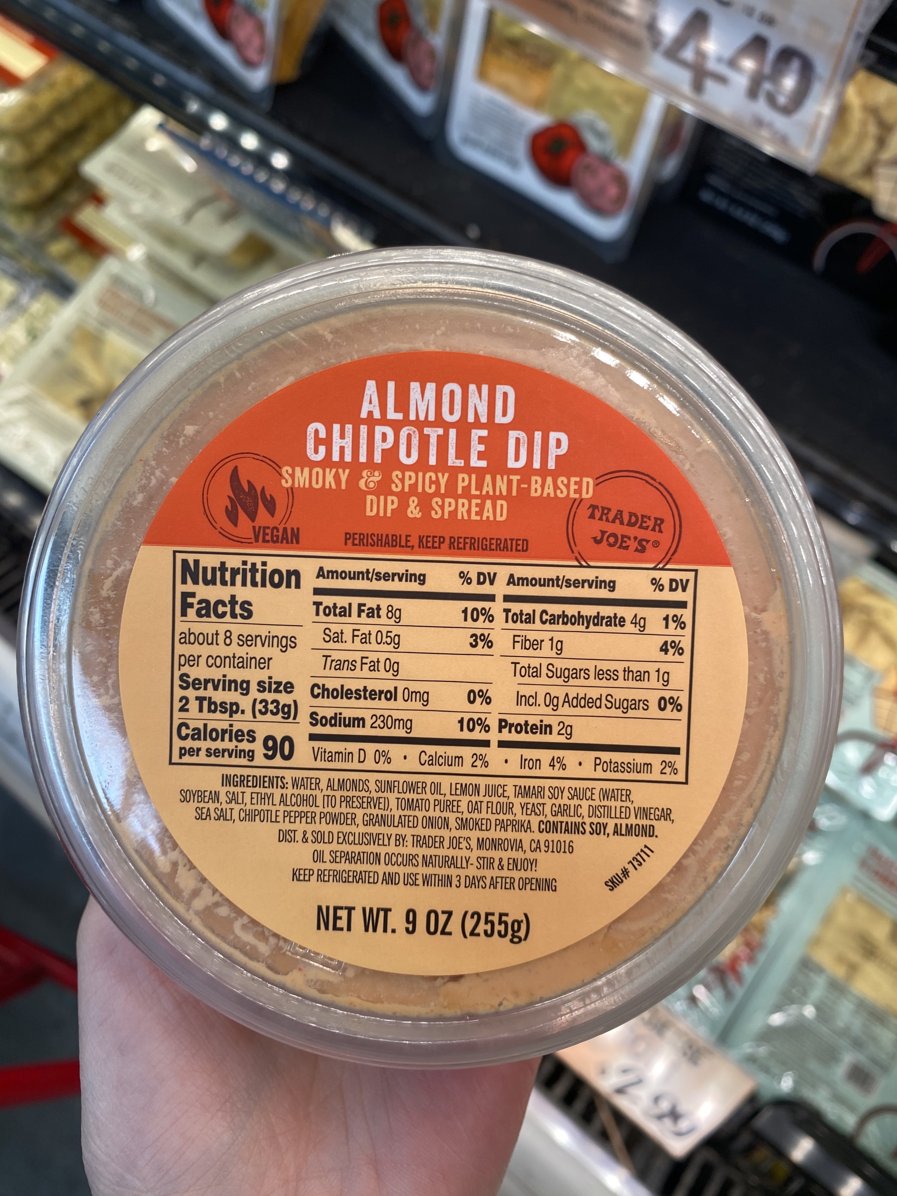 a container of trader joe&#x27;s almond chipotle dip
