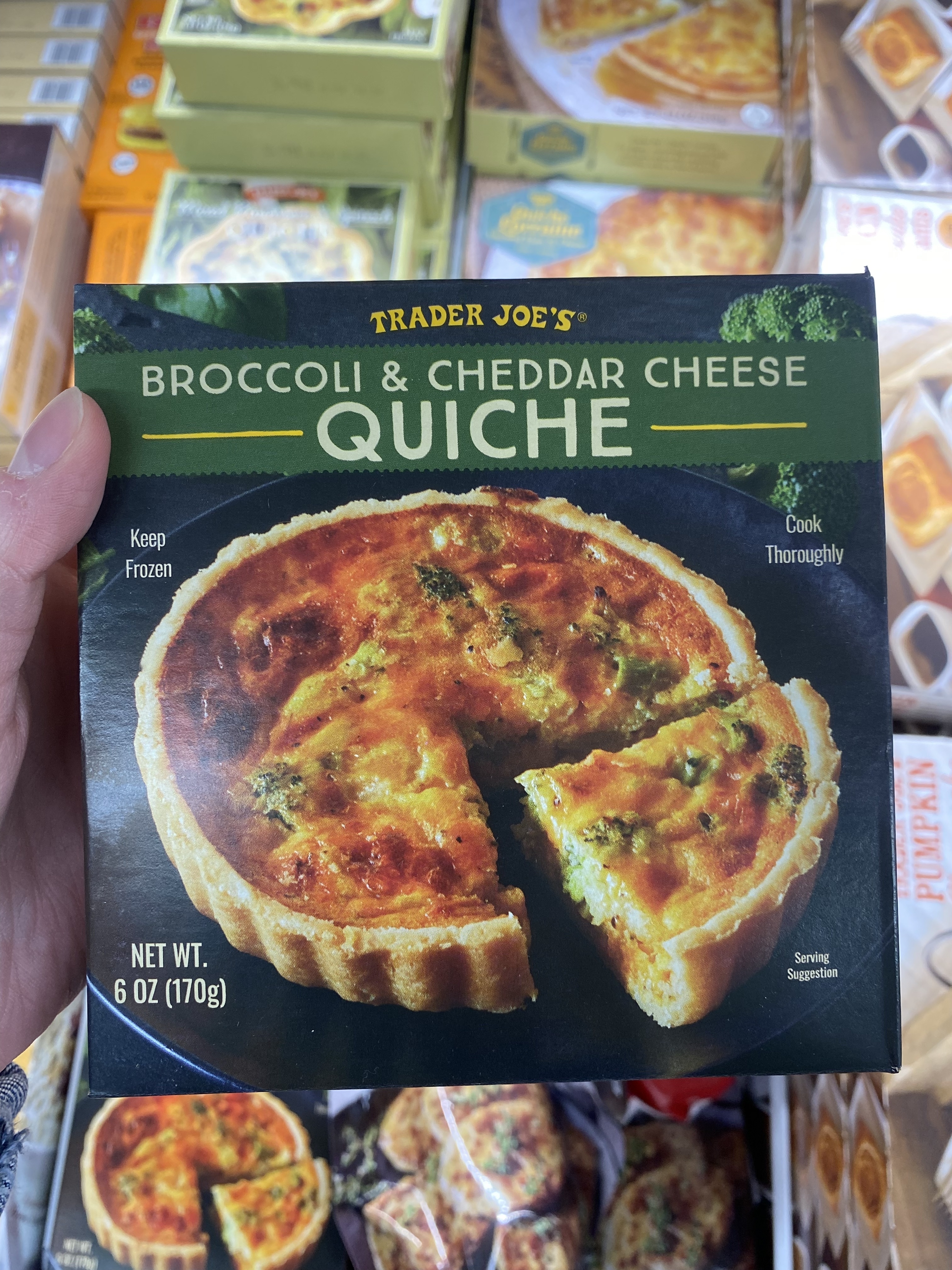a box of the broccoli and cheddar quiche