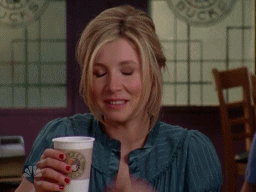 Sarah Chalke wiping her brow