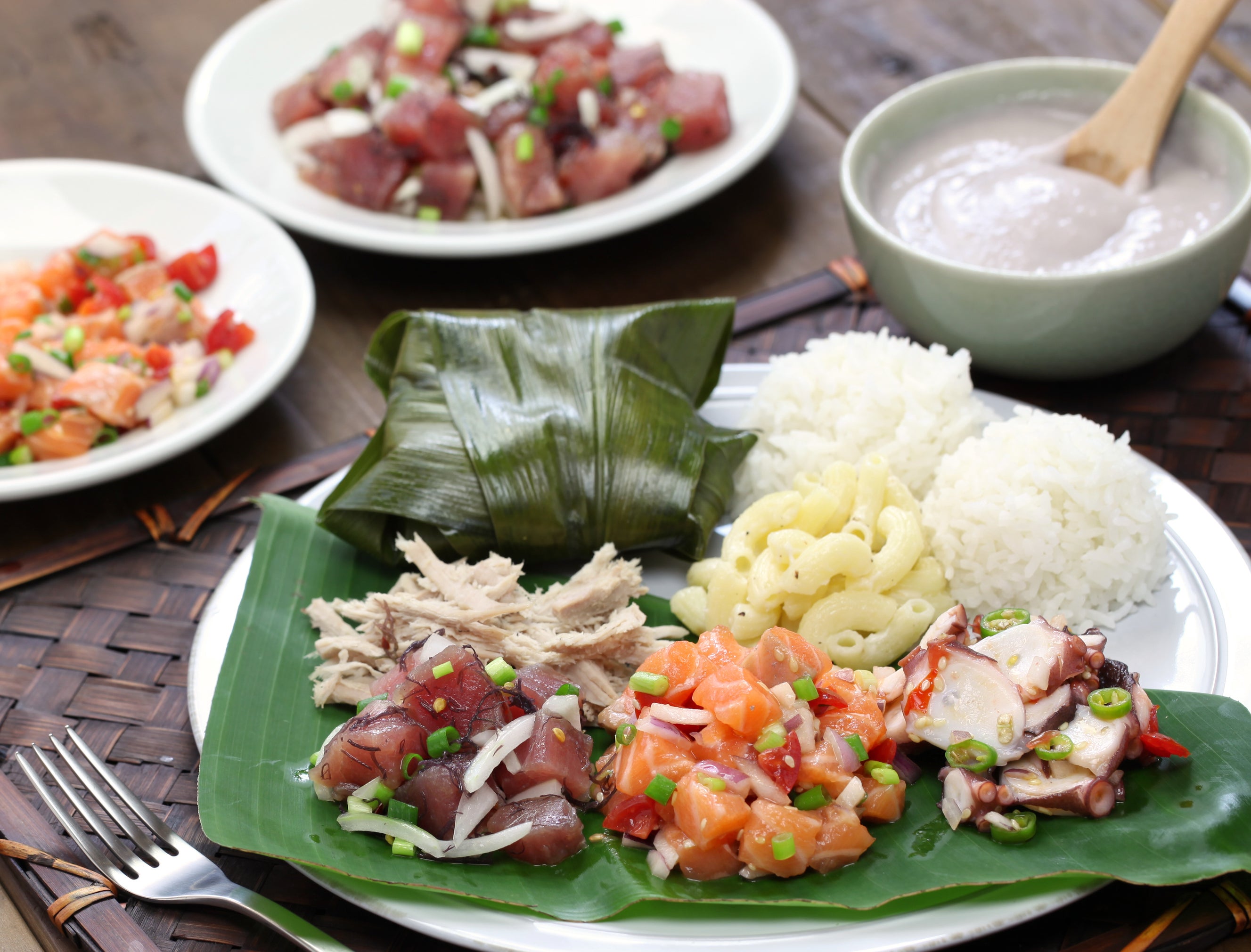 Hawaiian food, including lomi lomi salmon and kalua pork