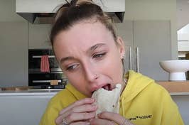 Emma Chamberlain eating a burrito from Taco Bell