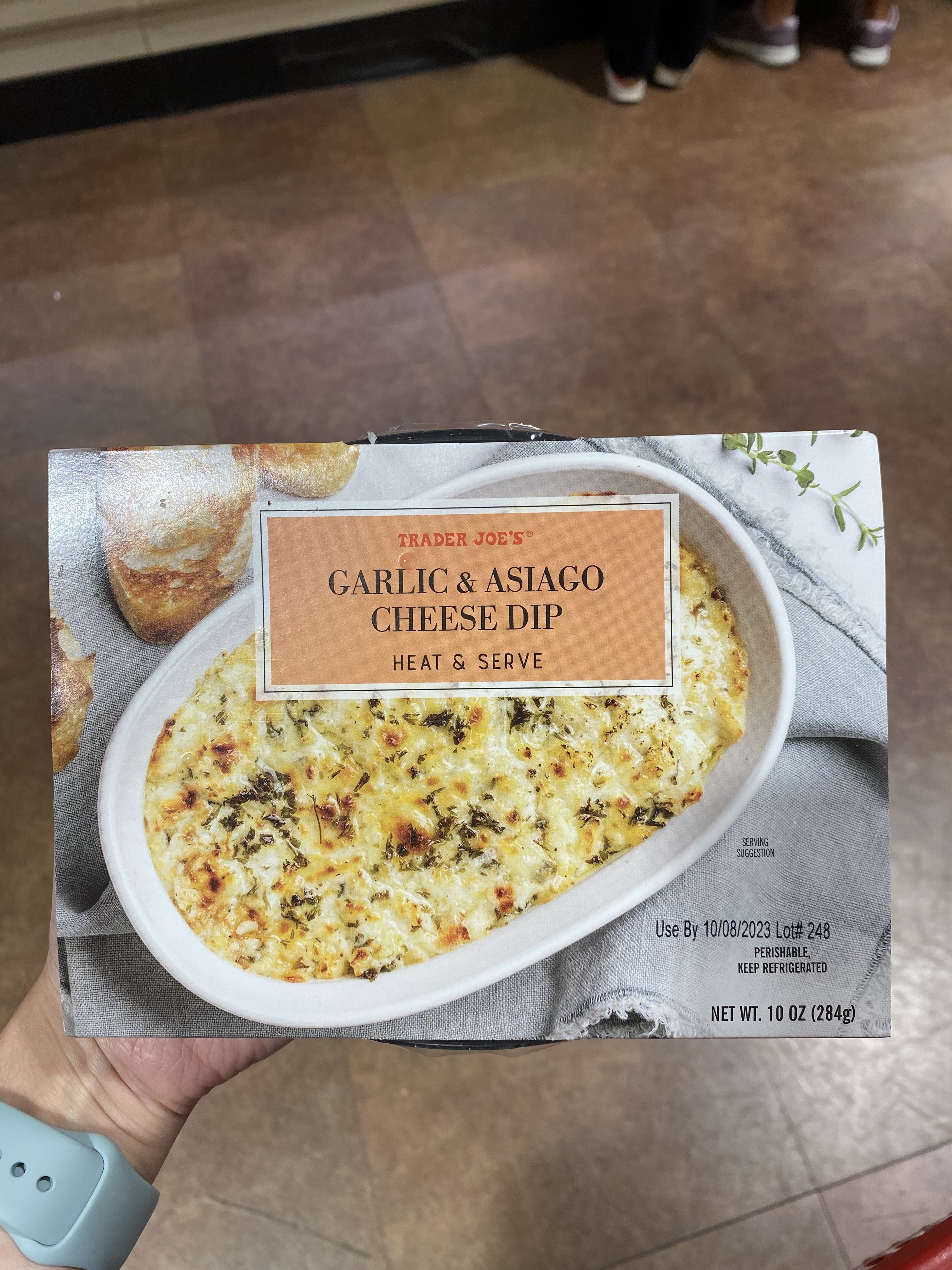 A box of garlic and asiago cheese dip