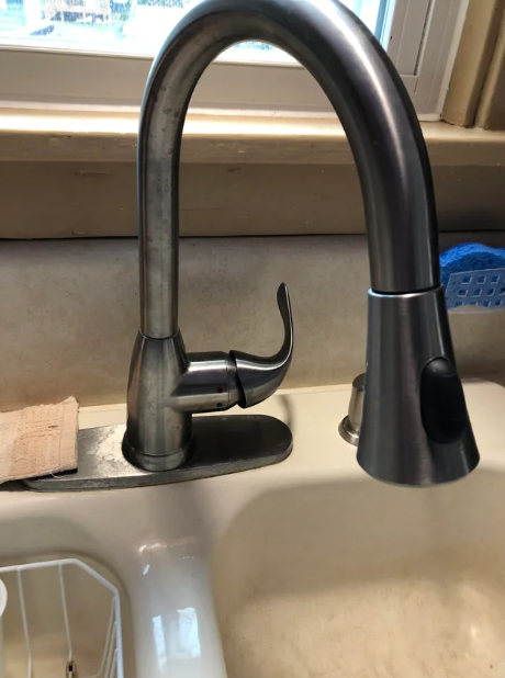 pull down faucet sprayer on a high arch kitchen faucet
