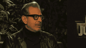 Jeff Goldblum gasps and starts laughing.
