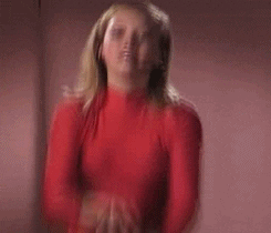 Hilary Duff dancing as Britney Spears.