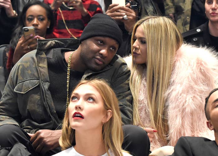 lamar and khloe at a sports event