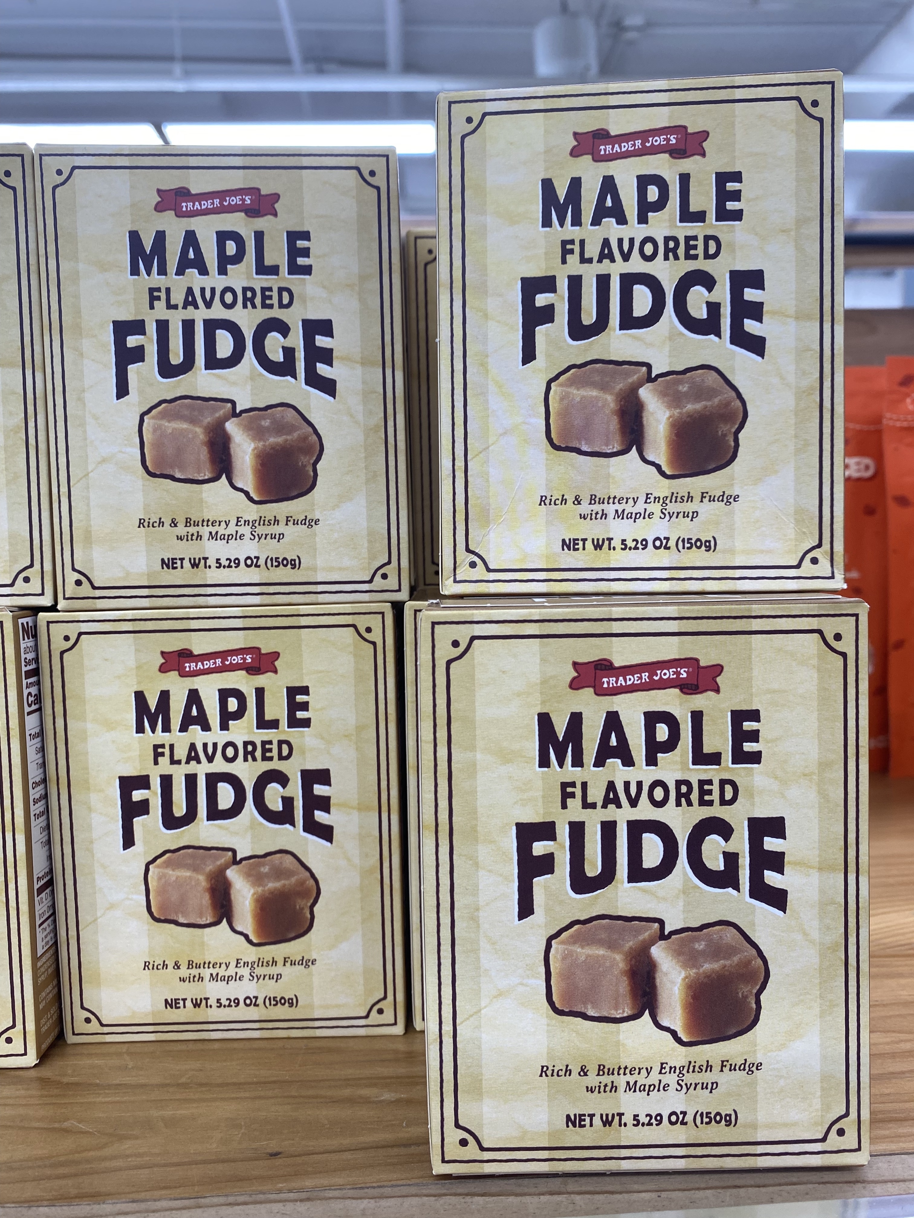 boxes of maple fudge on a shelf