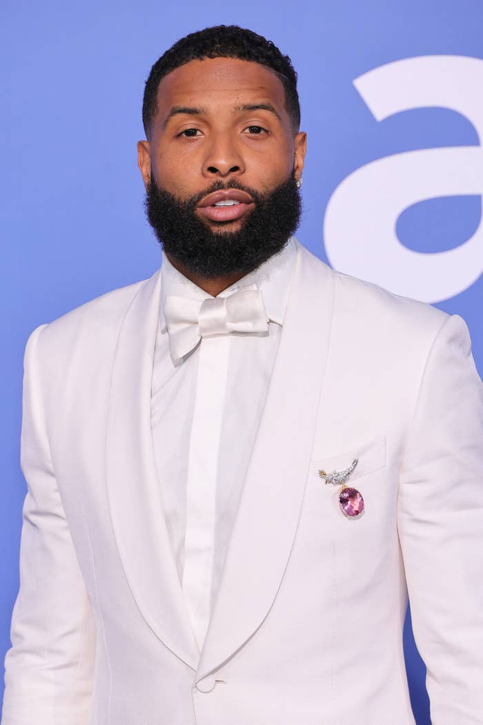 A closeup of Odell Beckham Jr. at a red carpet event in a tuxedo