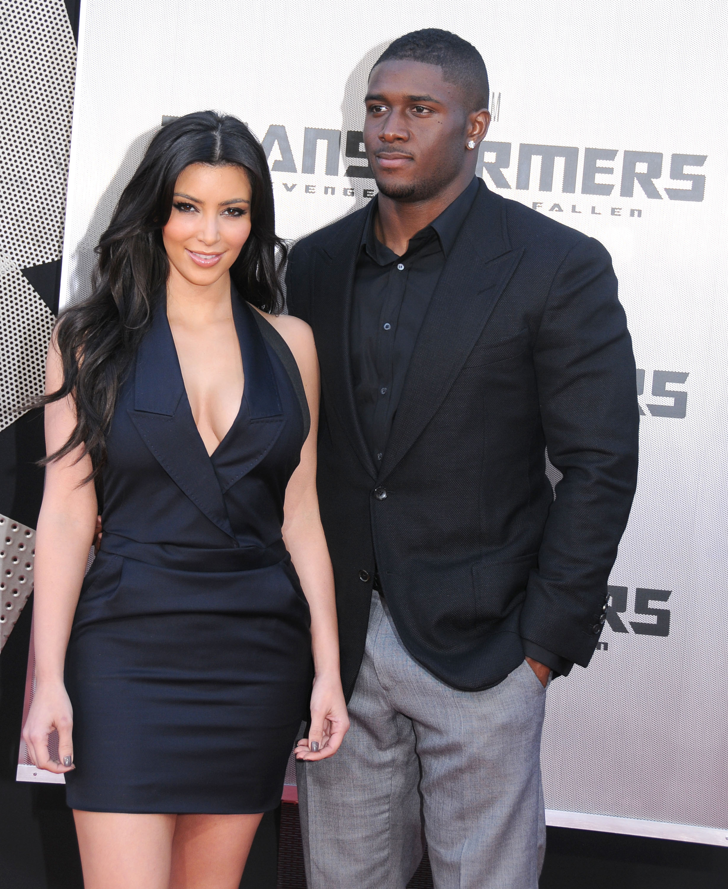 Kim and Reggie Bush at a media event