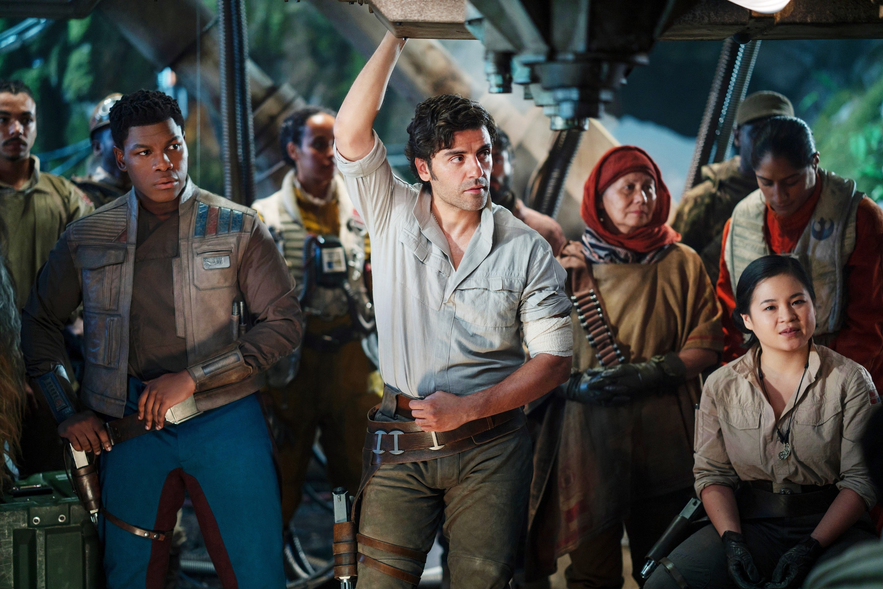 John Boyega, Oscar Isaac, and Kelly Marie Train stand with others in a scene from &#x27;Star Wars: The Last Jedi