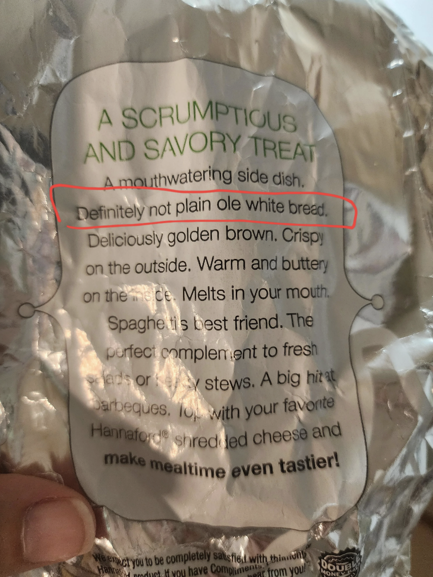 The bag of the bag describes the garlic bread, including saying it&#x27;s not plain old white bread