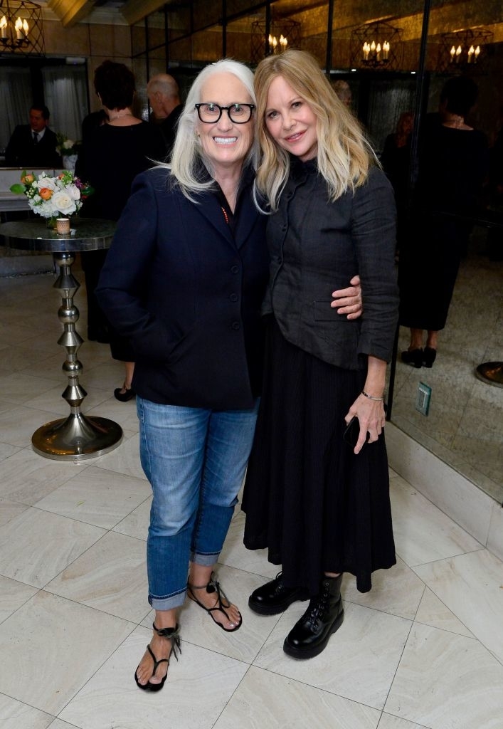 Meg Ryan posing with another woman