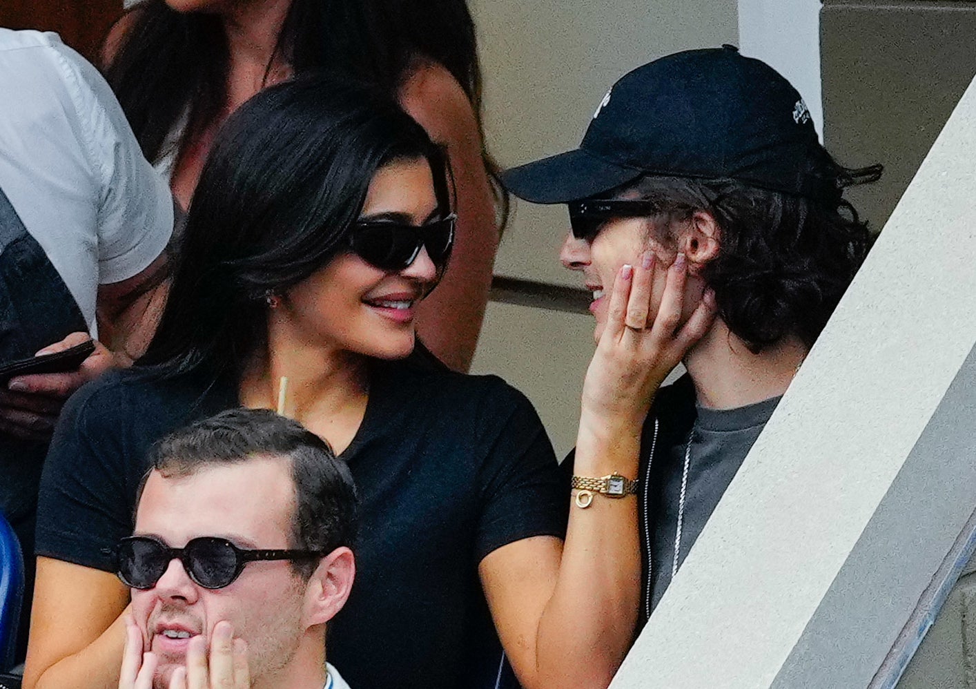 Smiling Kylie cupping smiling Timothée&#x27;s chin at the US Open