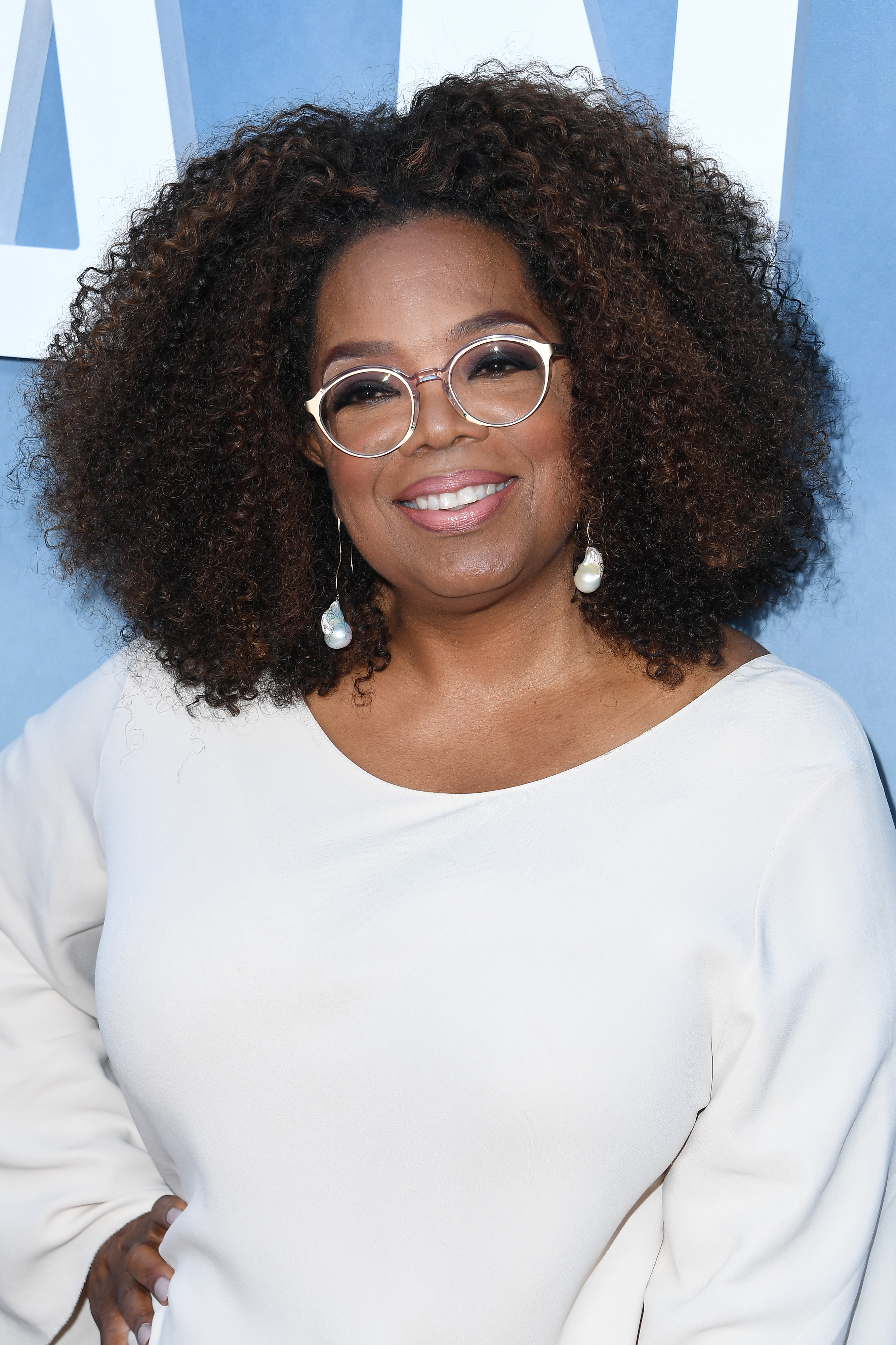 Close-up of Oprah at a media event