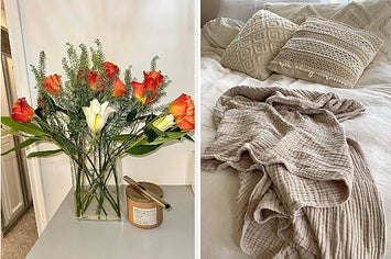 a bouquet of orange flowers in a book-shaped vase on the left and a beige-neutral throw blanket on the right