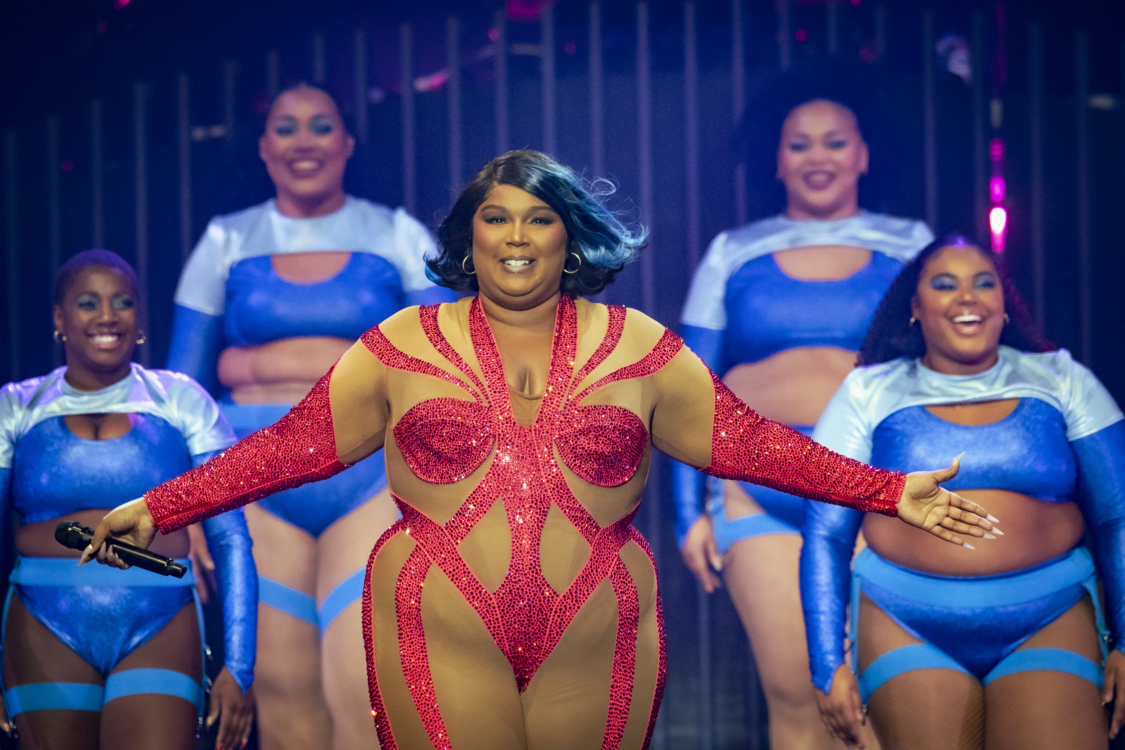 lizzo and her dancers on stage