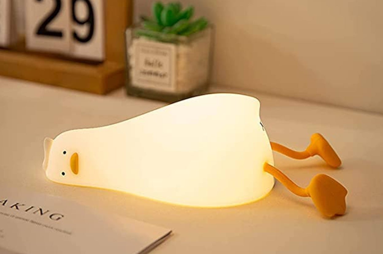 a photo of a lying down duck night light 