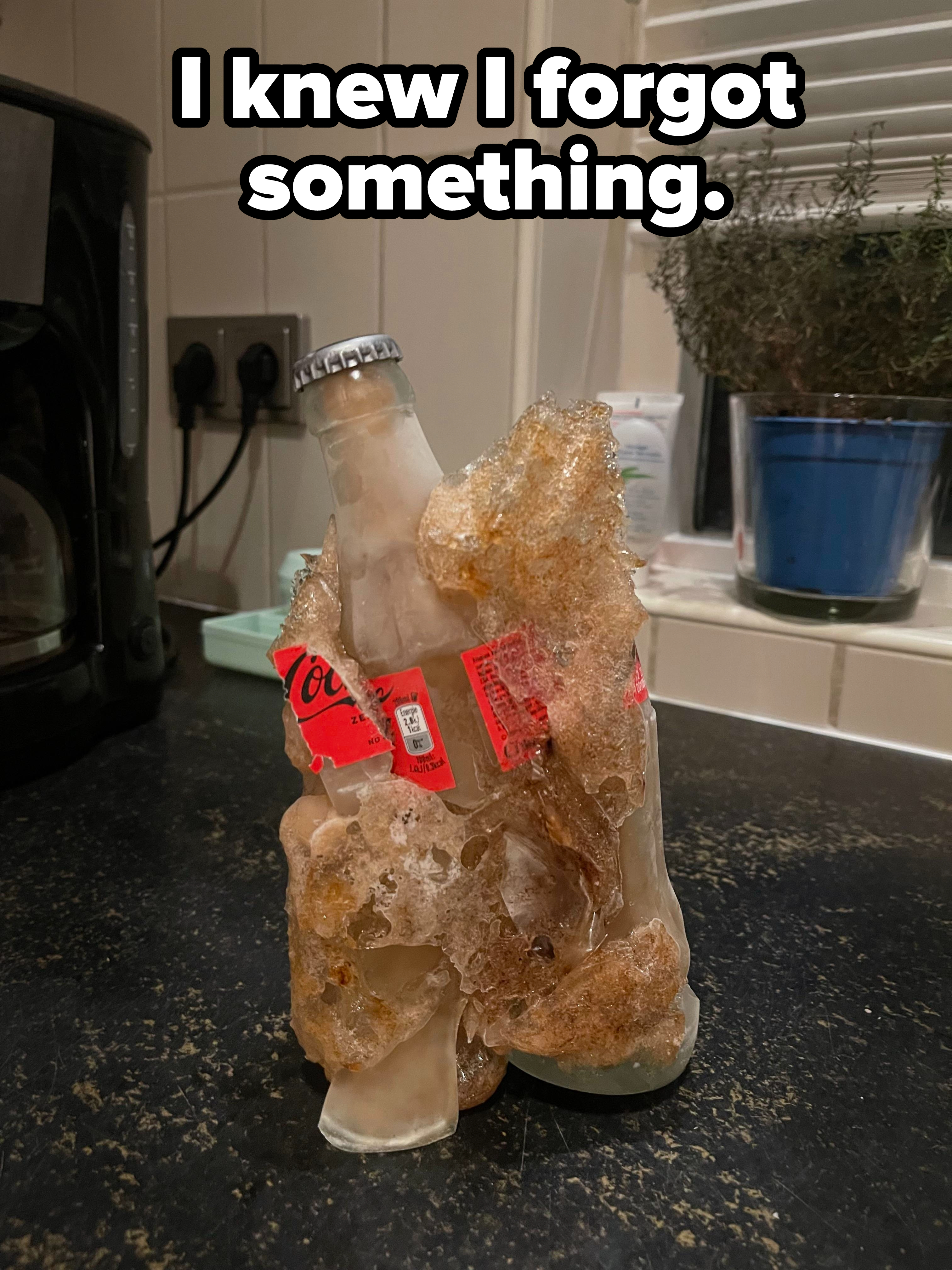 An exploded bottle of Coke with caption &quot;I knew I forgot something&quot;