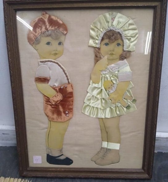 Dolls in a frame