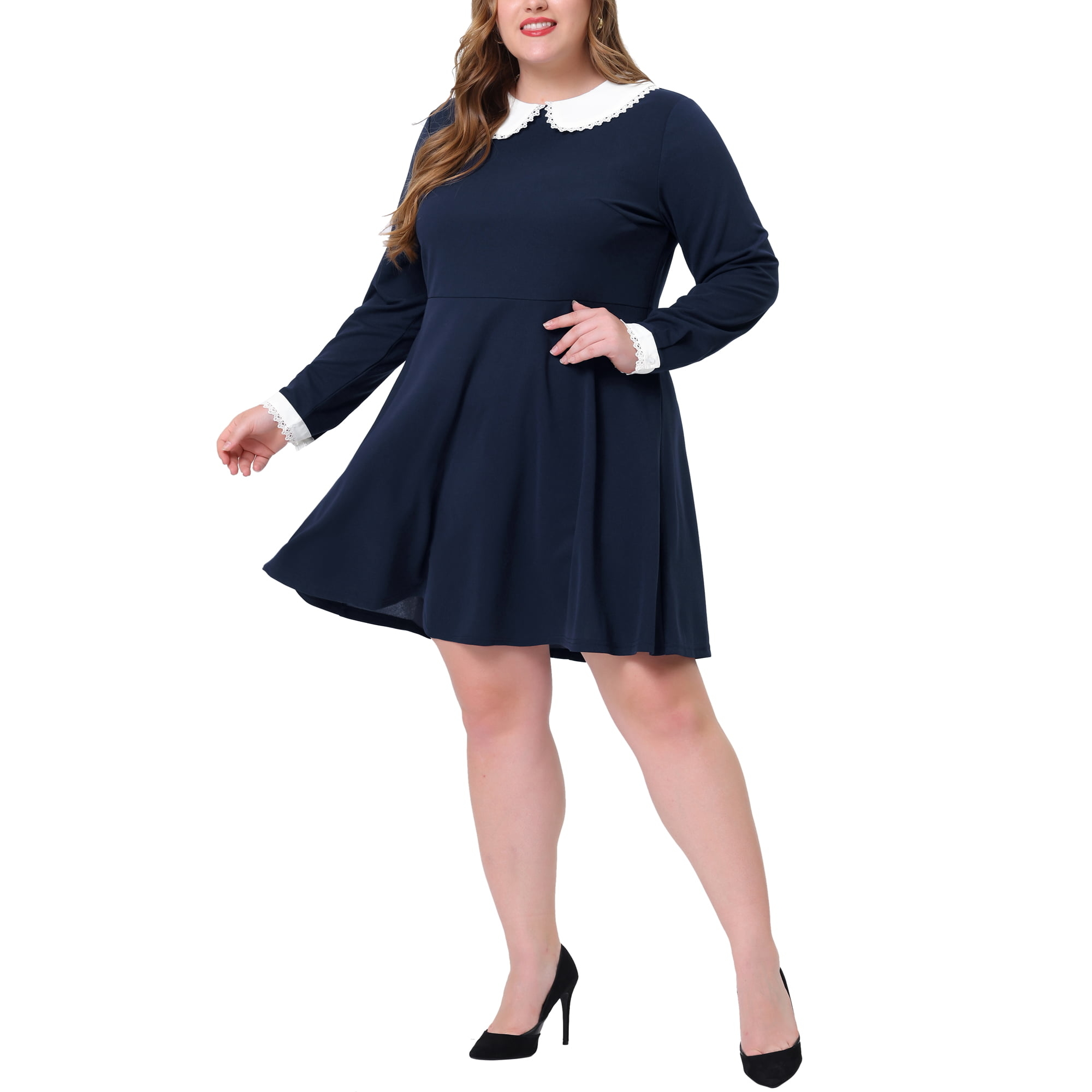 the dress in navy with long sleeves and a white collar