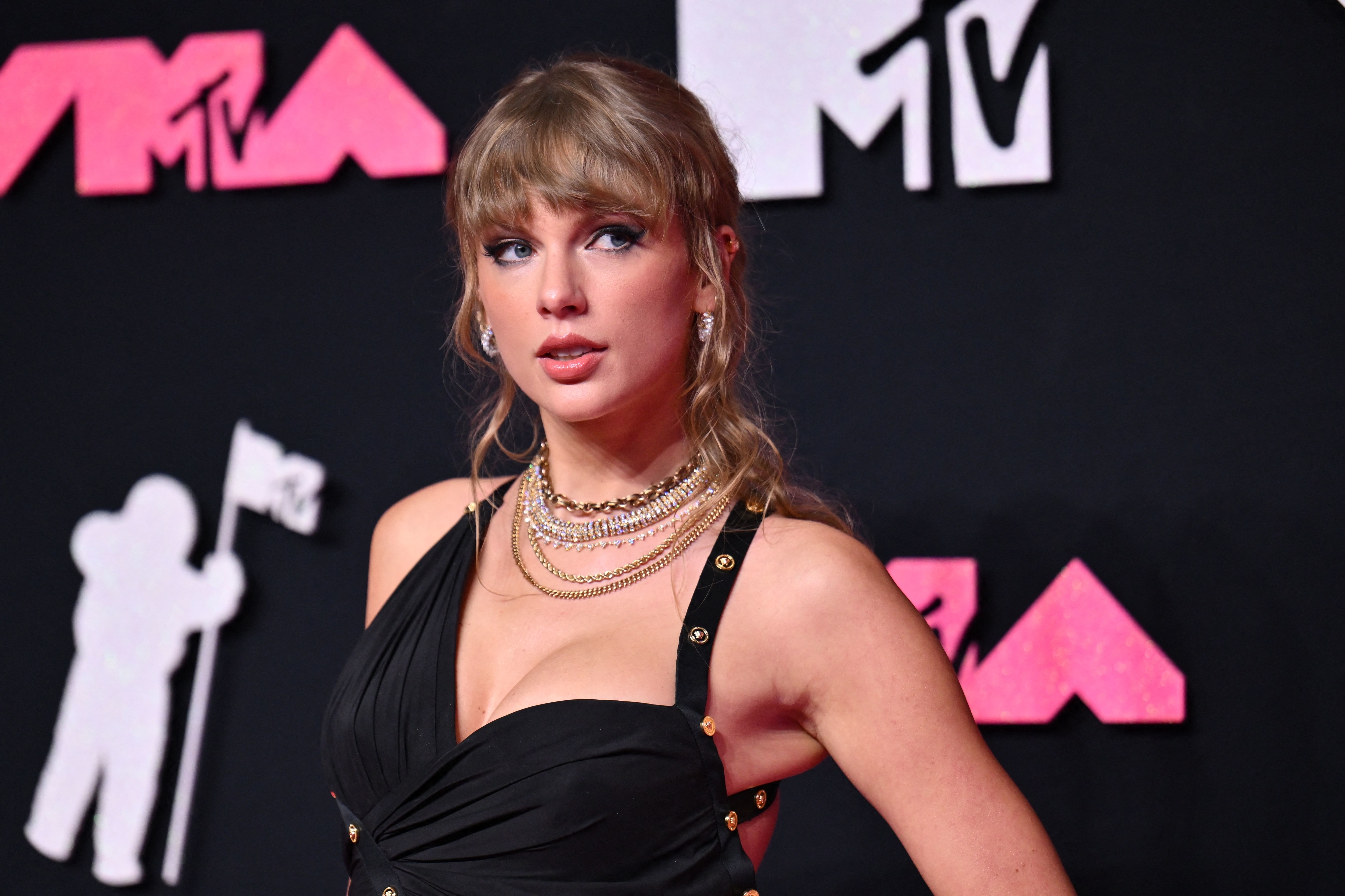 Close-up of Taylor at a media event