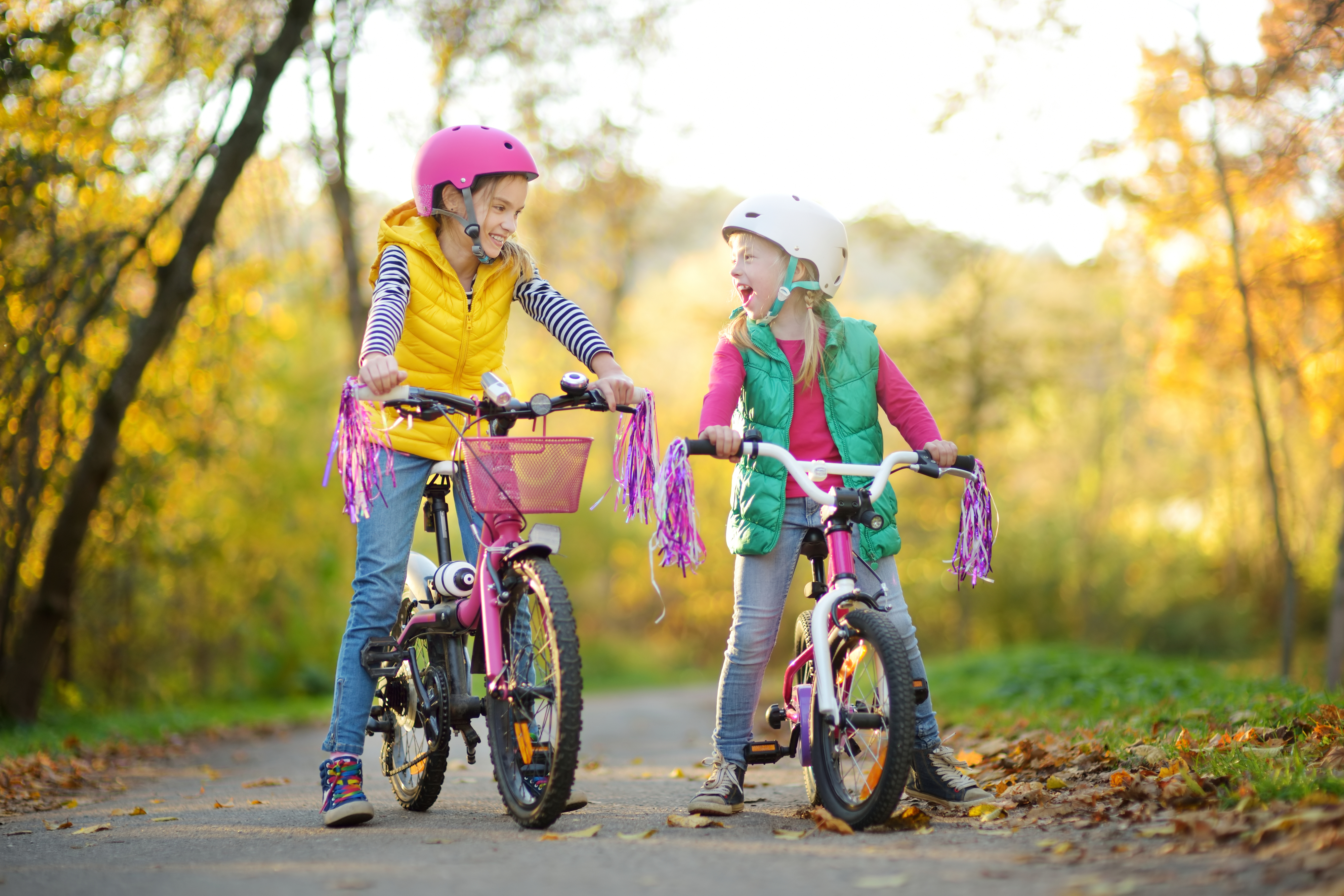 children riding their bikes outside