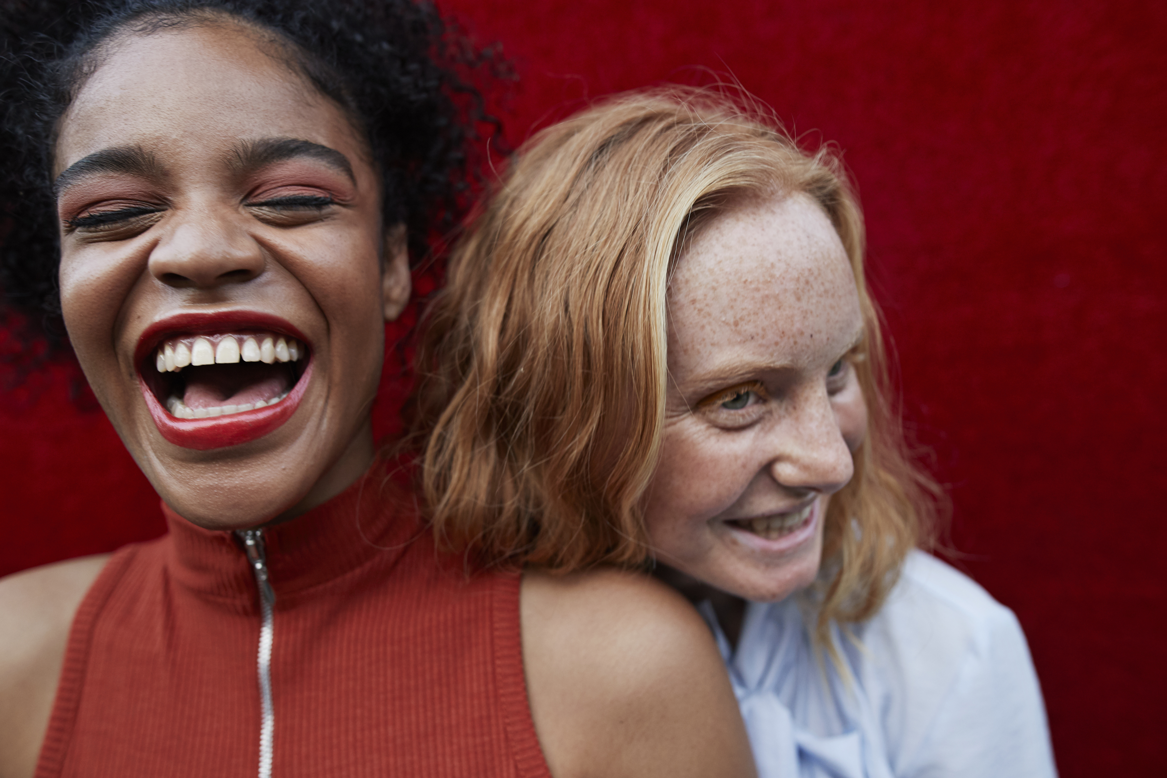 two women laughing together