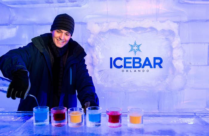 Bartender pours drinks in ICEBAR