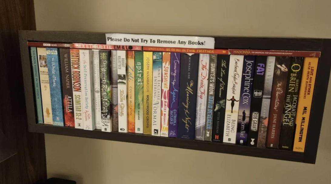 note above reading, please do not try to remove any books