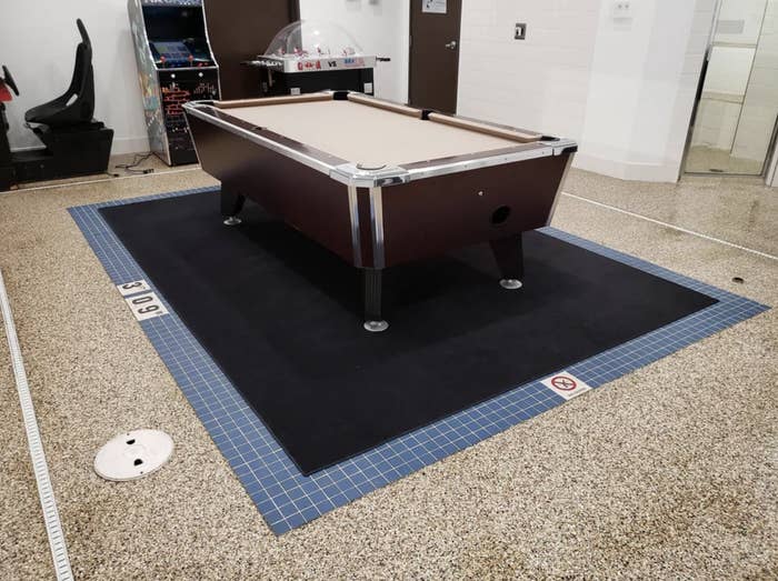 A pool table where a pool used to be