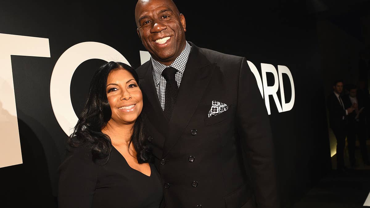 The Los Angeles Lakers legend and his wife received the Elizabeth Taylor Commitment to End AIDS Award on Thursday night.