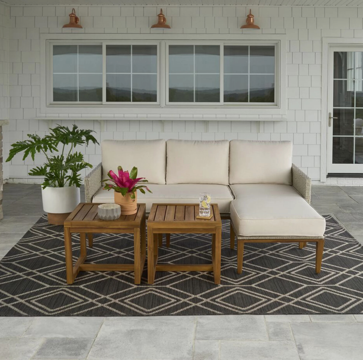 Cream fabric and wood framed patio sectional