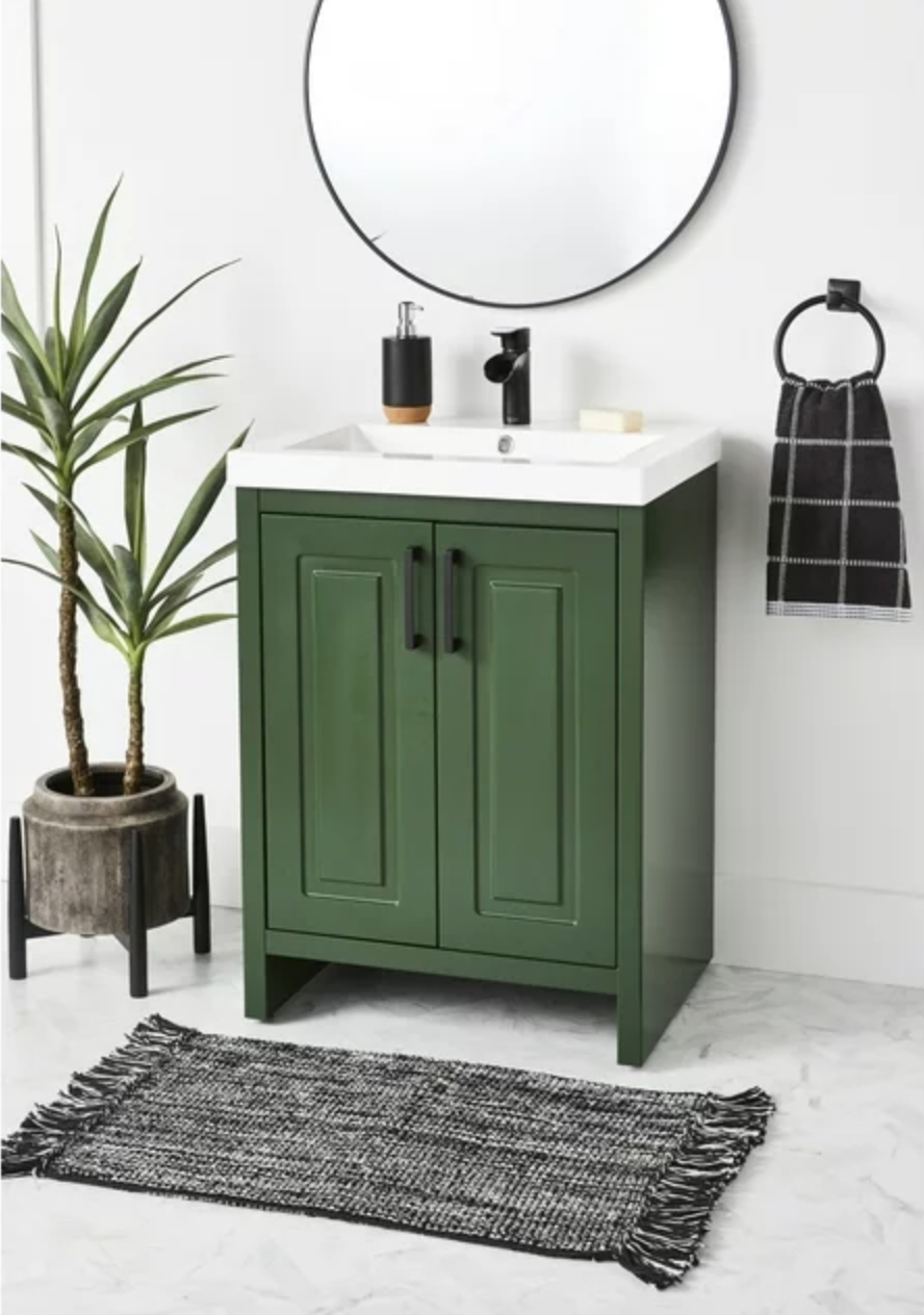 Forest green single vanity with white sink