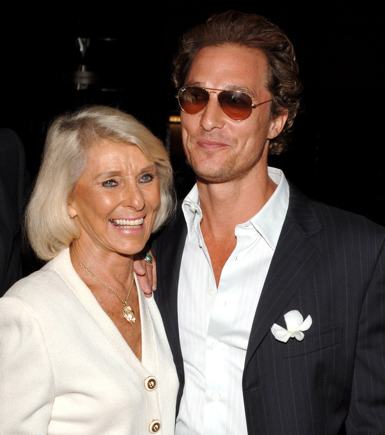 Close-up of Matthew and Mary smiling at a media event