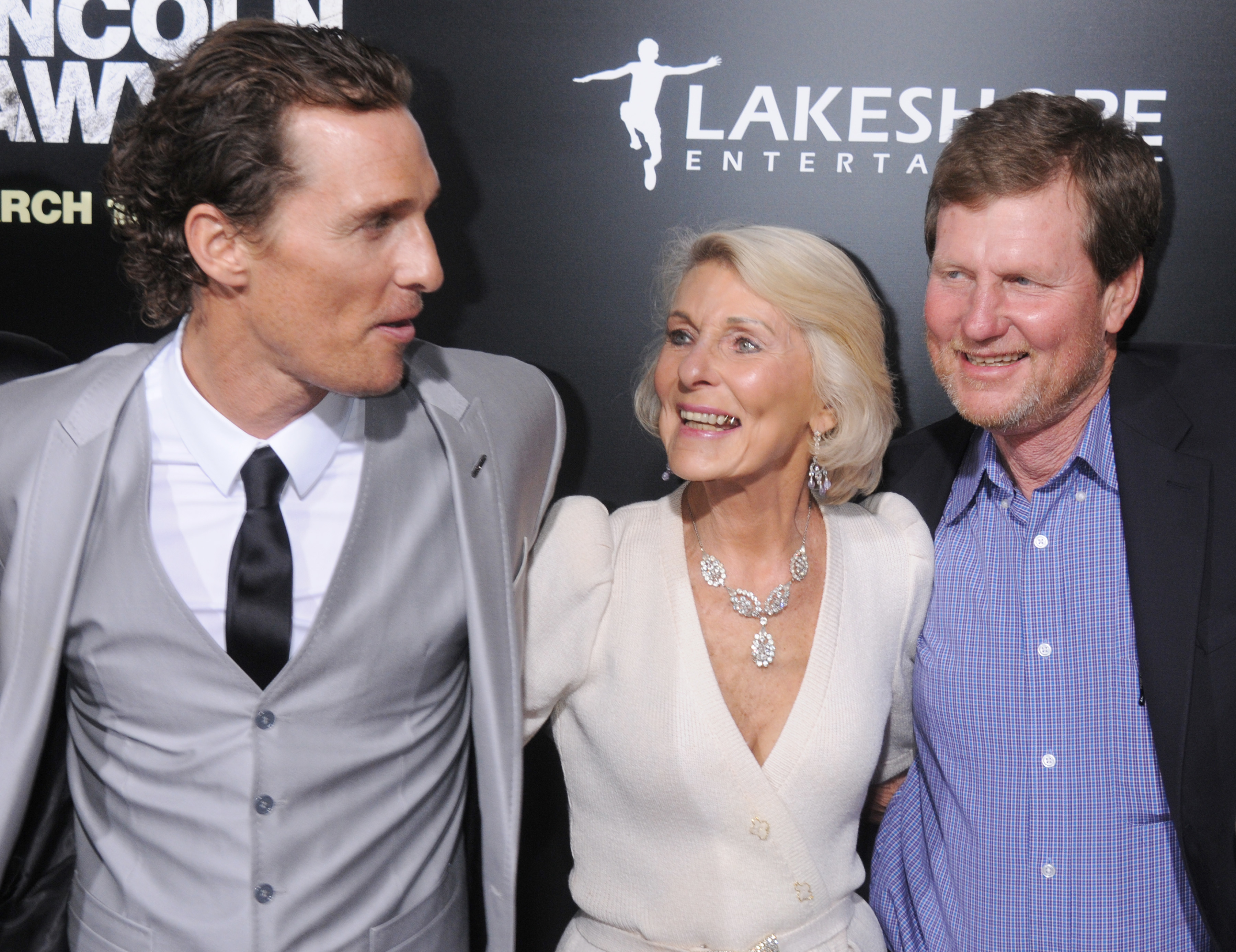 Close-up of Matthew, Mary, and one of Matthew&#x27;s brothers at a media event