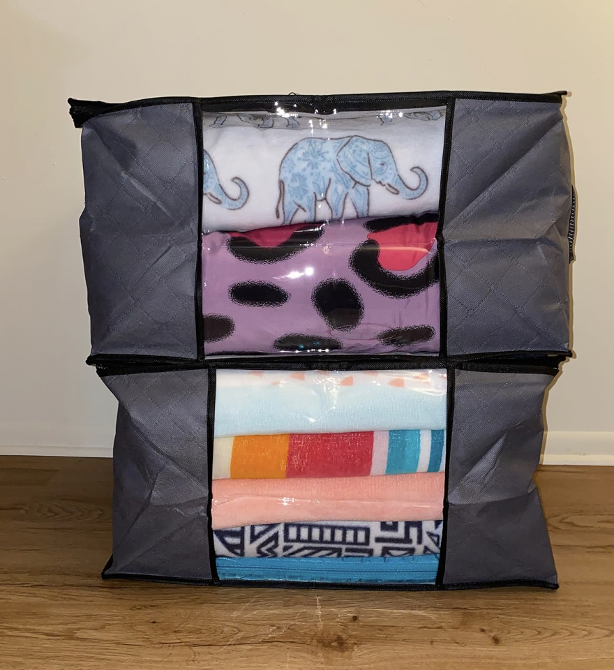 two packed fabric storage totes stacked on top of each other