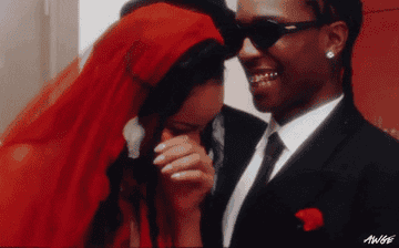 GIF of Rihanna and A$AP Rocky laughing