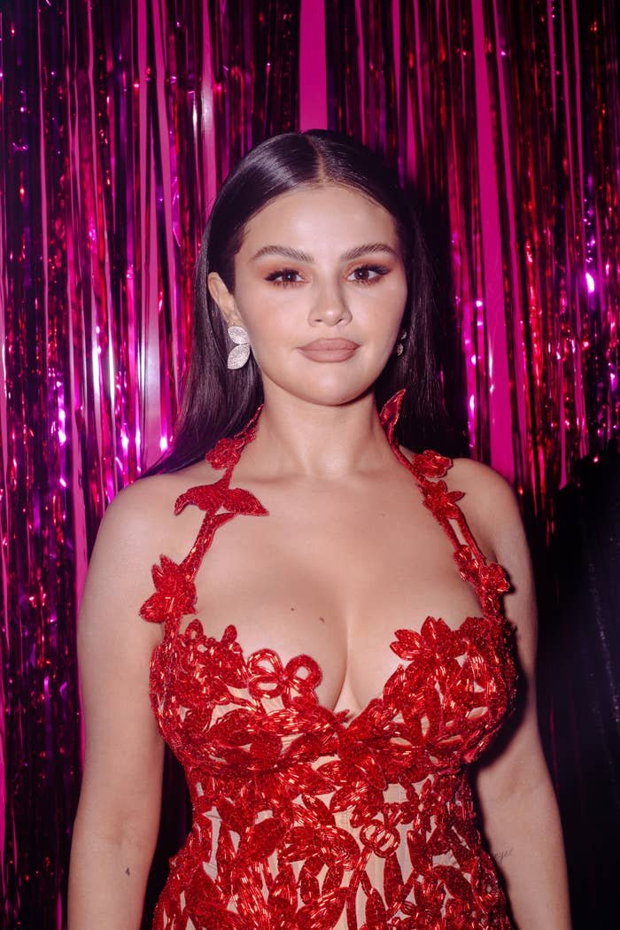 Closeup of Selena Gomez in a lace halter dress