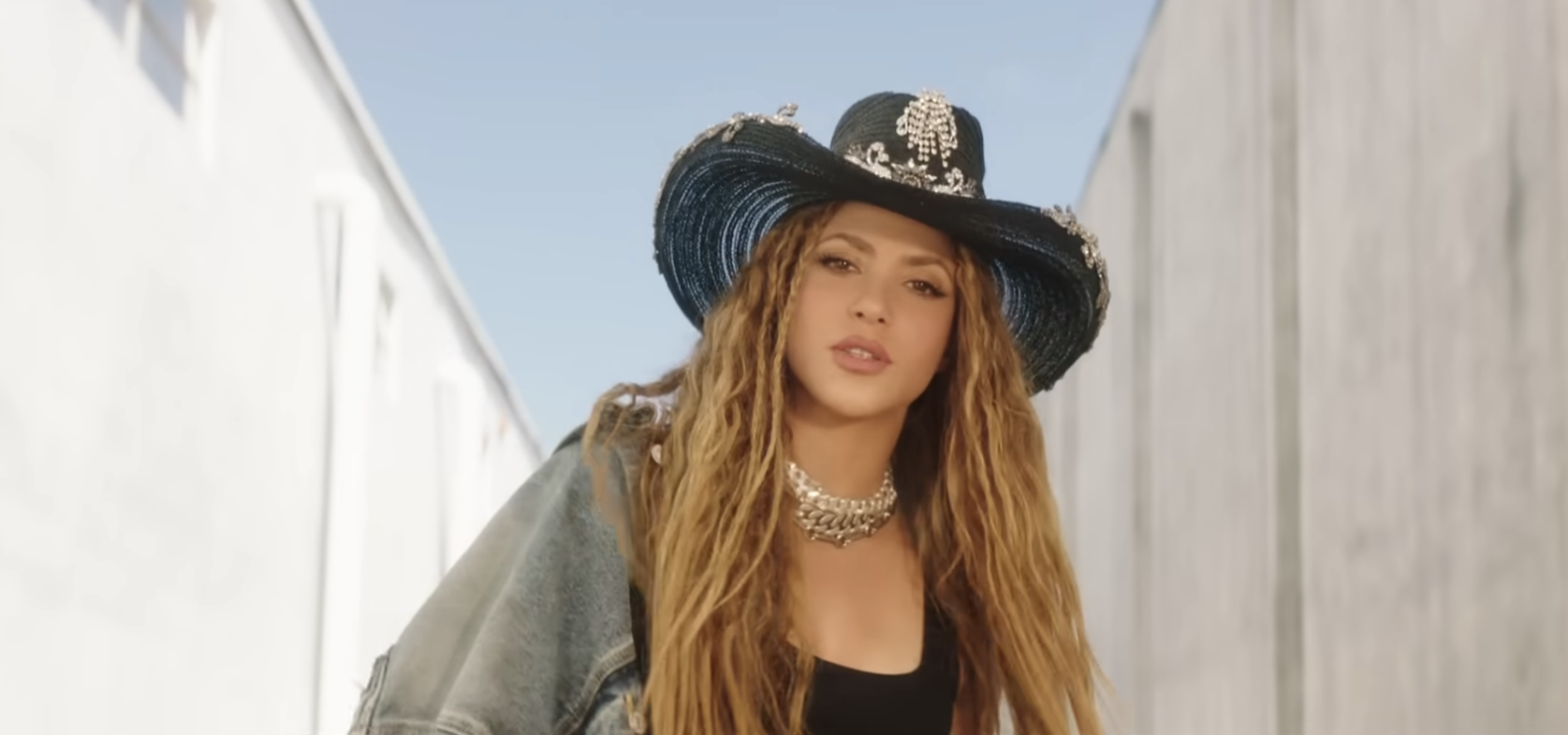 Shakira wearing a wide-brimmed hat
