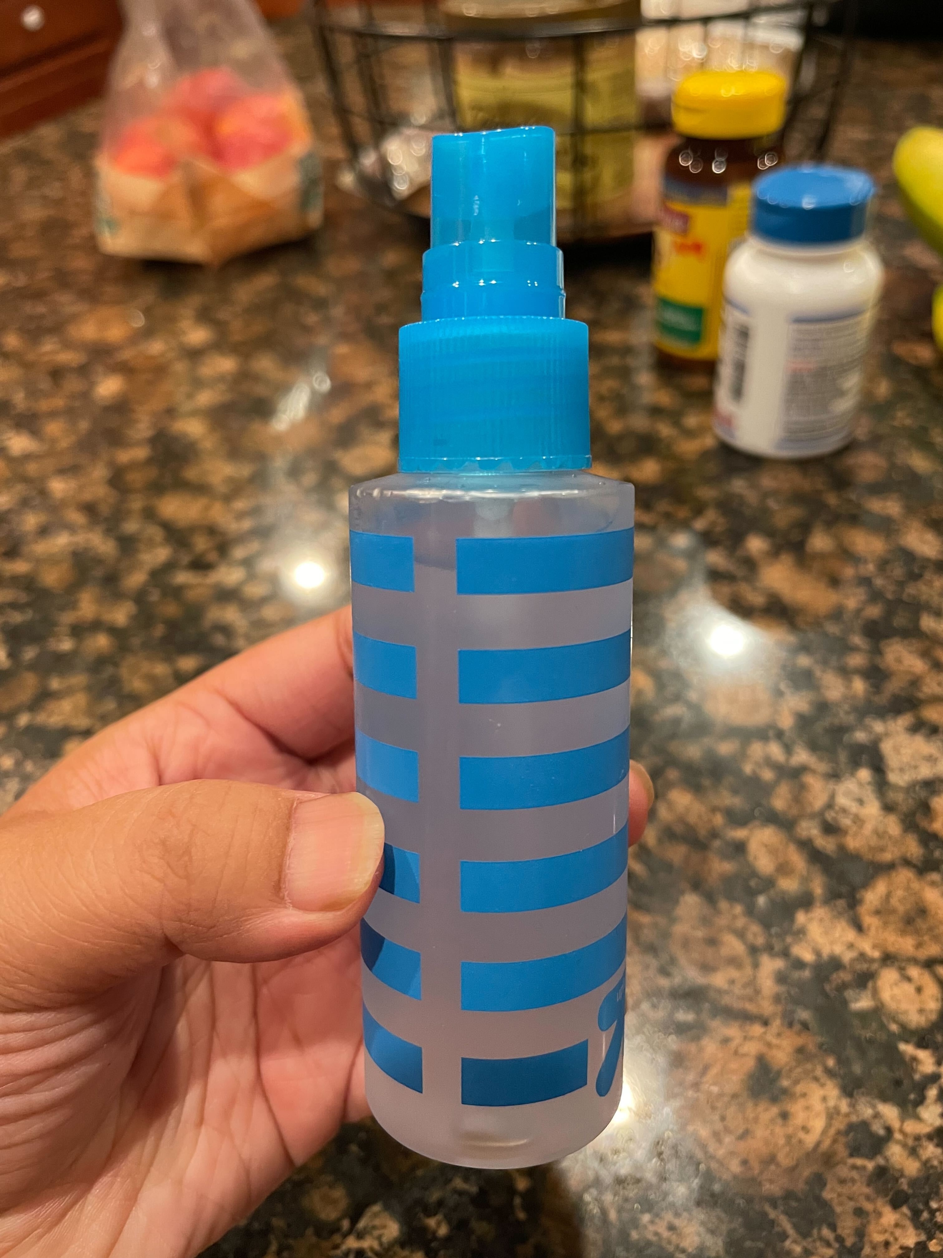 The author transferred the rice water into a spray bottle