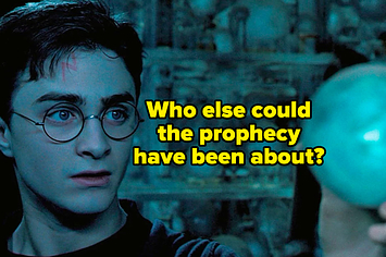 Harry holding the prophecy. 