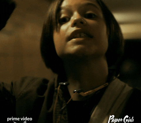 A teenage girl putting an &quot;L&quot; up to her forehead and saying &quot;see ya losers&quot;