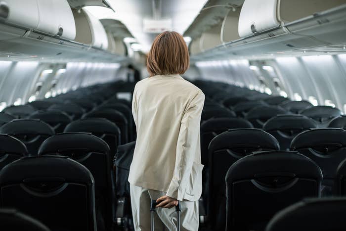 A woman boarding a plane