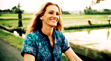 Julia Roberts in Eat, Pray, Love riding a bike down the countryside